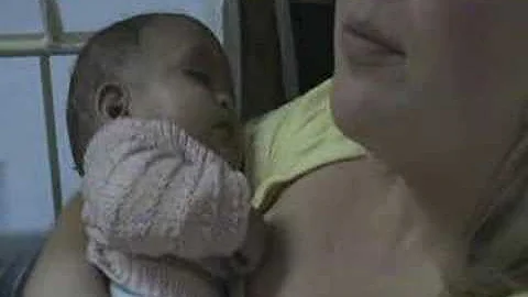 Noah cuddling with mommy