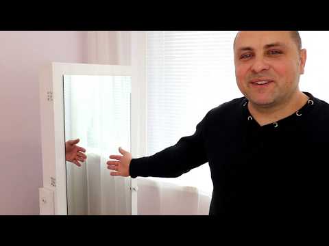Видео: Нисък шкаф: ниски, затворени модели по стената за съхранение на дрехи и бельо, опции за поставяне за разделяне на стаята