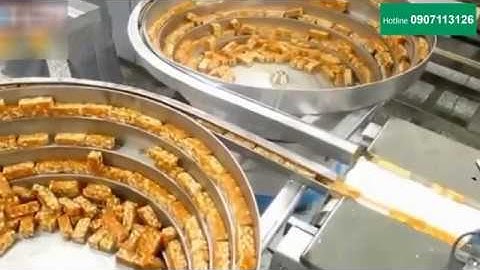 Máy đóng gói kẹo lạc có cấp liệu tự động - 200 viên/phút