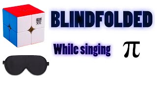 Solving a 2x2 rubik's cube blindfolded while singing pi