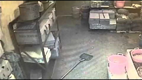 Raw: Burglar With Five Gallon Bucket on His Head