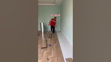 Lát sàn gỗ công nghiệp cực nhanh cho phòng khách
