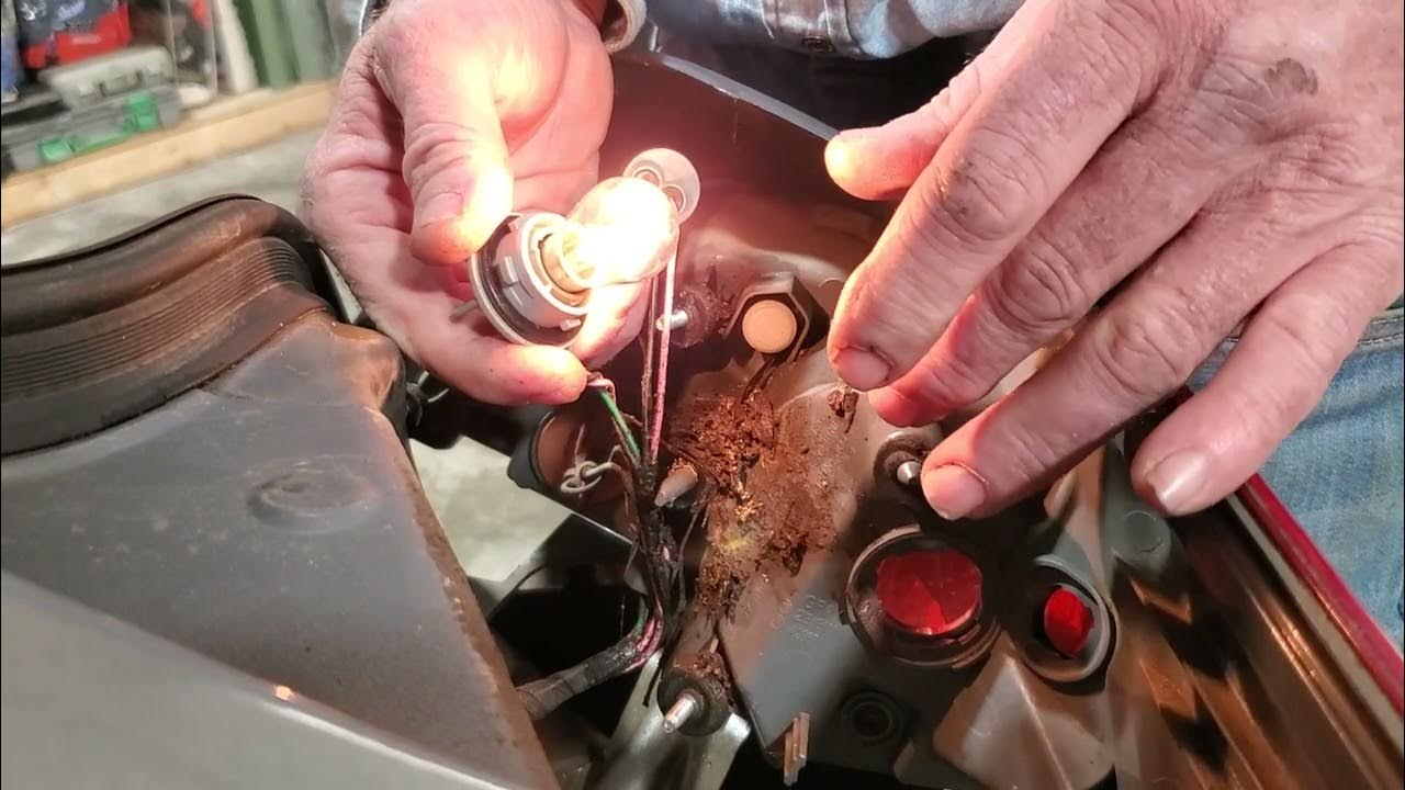 1 brake light brighter than the other after changing bulb on 2011