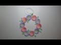 DIY A wreath of paper flowers. Paper decorations.