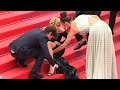 Cannes: 'Sybil' cast help Virginie Efira with her shoes