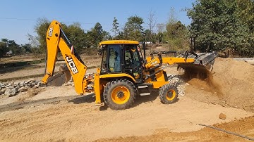 JCB Backhoe Machine Making Diversion of Road and Working For Road Construction - Backhoe Loader