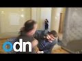 Ukrainian politicians get into fist fight outside parliament chambers