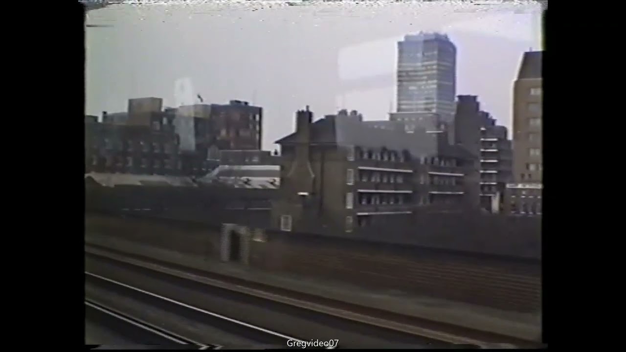 London Waterloo to Vauxhall by train in 1994. View from network Southeast train over Lambeth.