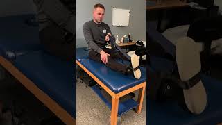 Strap assisted knee extension with quad set assisted knee extension