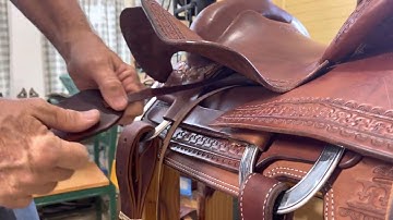 Trick to re threading stirrup leathers over the bars!