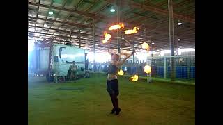 CIMG7744 A fire spinner spins a flaming hula hoop at the Maker Faire 2007