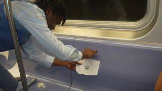 Running an Auction for Commuter Seats on the Busy NYC Subway
