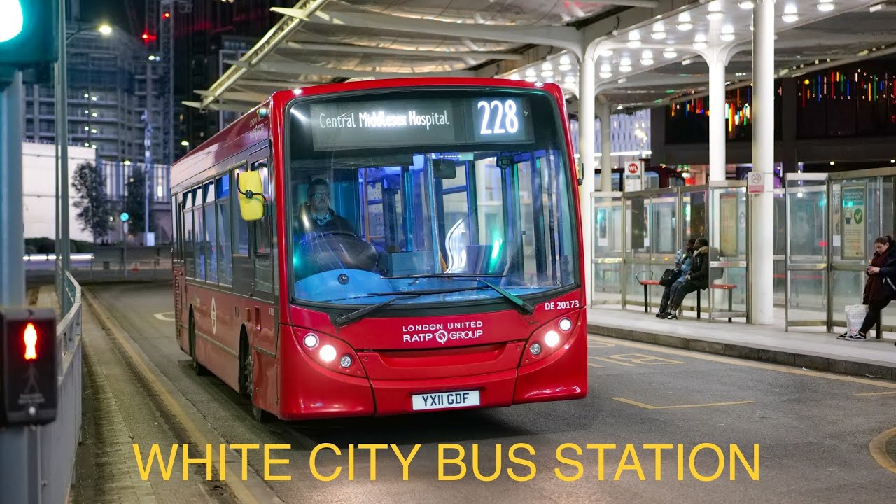 London's Buses after dark in White City bus station on 27th January