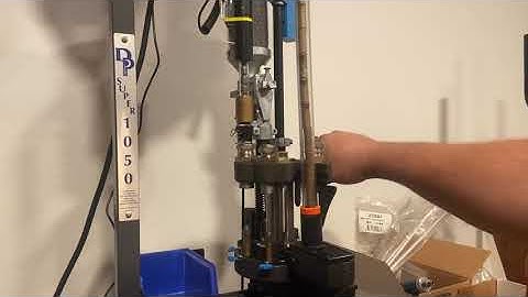 Dillon super 1050 with Mr bullet feeder.