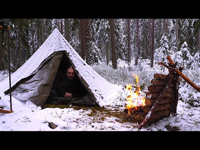 Winter Bushcraft Hike in the Northern Wilderness - Canvas Lavvu - Swedish Torch Cooking - Snow