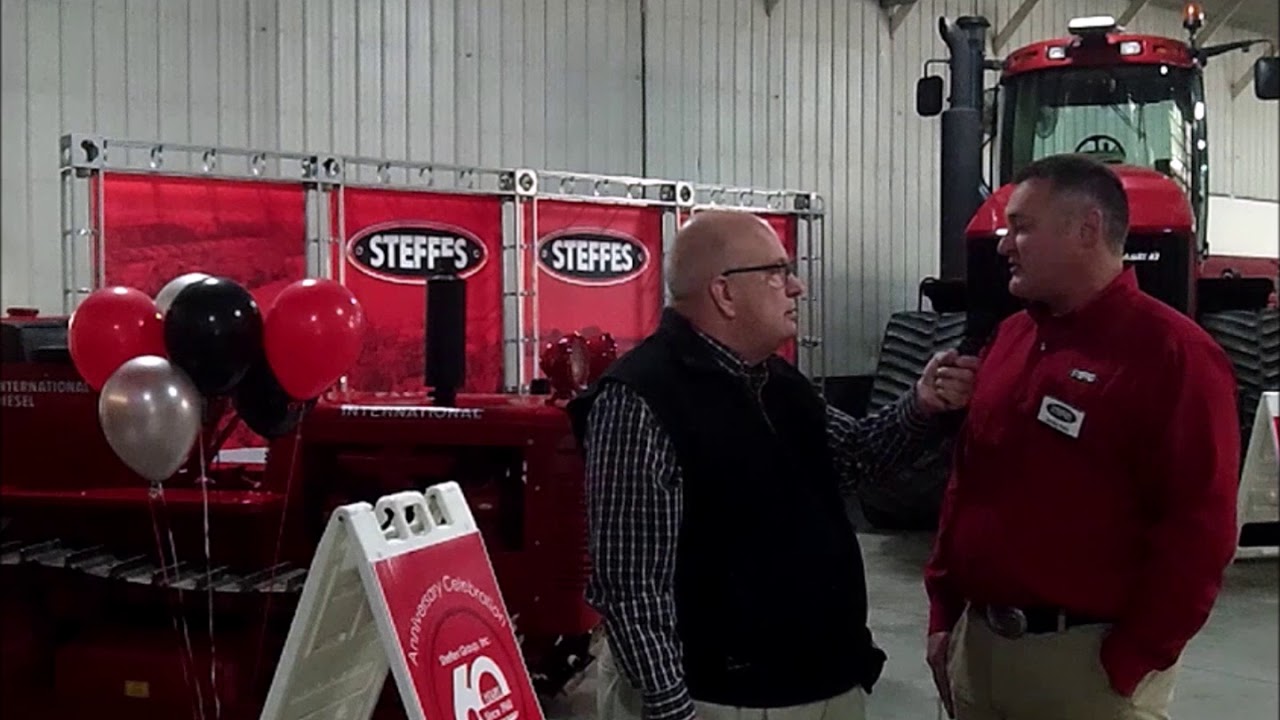 Jeff with Ashley Huhn of the Steffes Group on 60 years in business