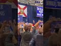 Crowd chants “USA” as President Trump enters the stage at the “Golden Age for Your Golden Years”