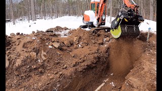 Screening dirt into a trench