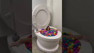 Going Under in Worlds Largest Toilet SURPRISE EGG Pool #shorts Resimi