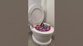 Going Under in Worlds Largest Toilet SURPRISE EGG Pool #shorts