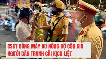 CSGT dùng máy đo nồng độ cồn giả. Người dân tranh cãi kịch liệt.