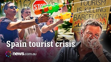 Furious Spanish protesters unleash on tourists