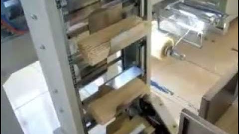 Automatic spaghetti weighing and packing machine~