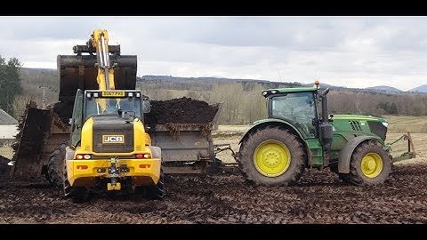 Compost spreading with John Deere and JCB.
