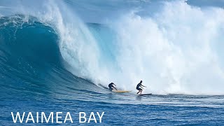 Surfing Big Waves At Waimea Bay On The North Shore Of Oahu In Hawaii Surfing Big Waves At Waimea Bay On The North Shore Of Oahu In Hawaii