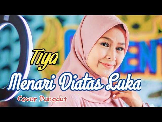 Menari Diatas Luka (Imam S Arifin) - Tiya (Cover Dangdut) Music Lyrics class=