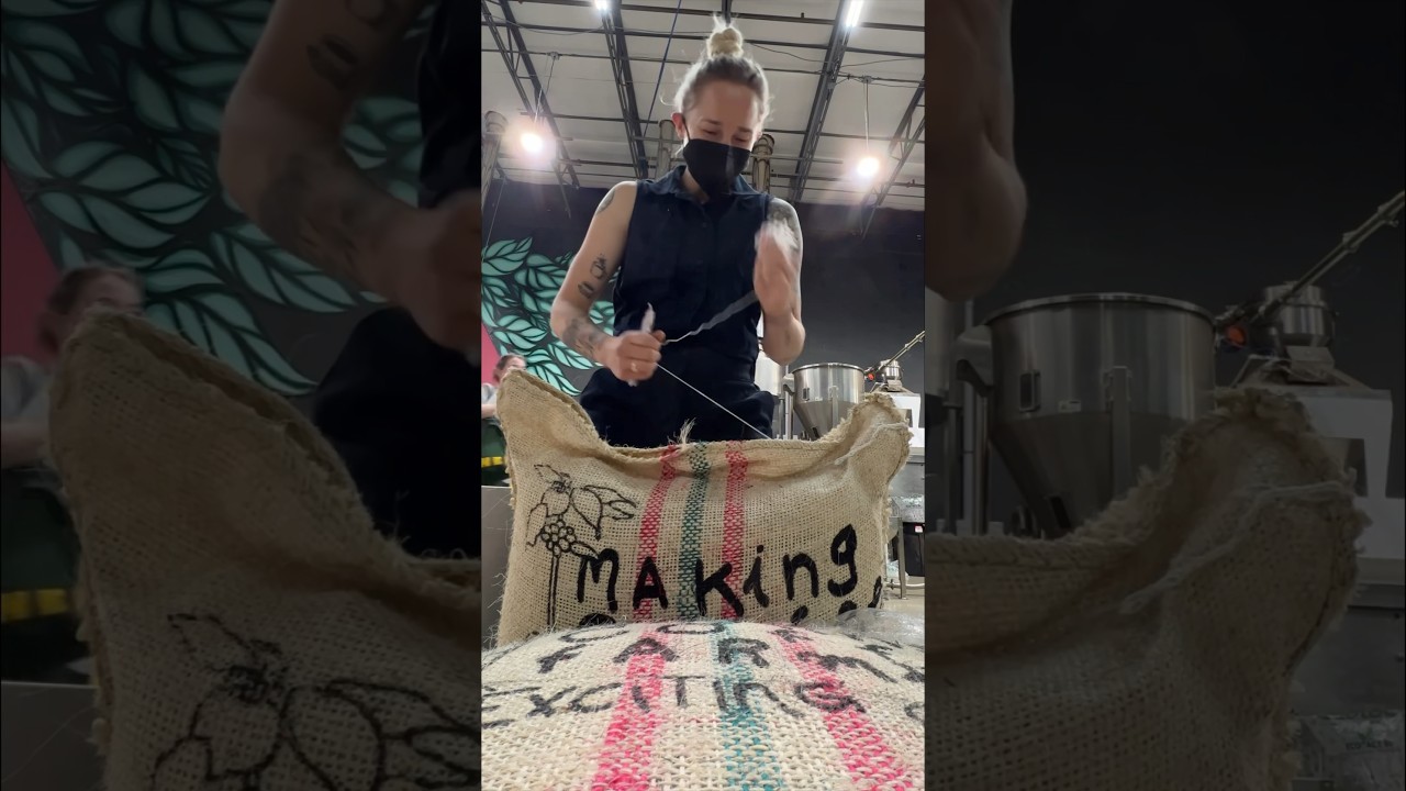 Opening a green coffee bag 