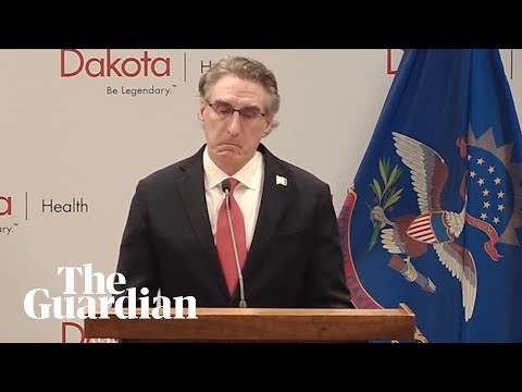 North Dakota governor in tears at split over face mask use in the US
