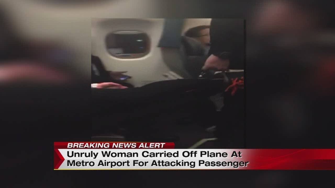 Unruly woman carried off plane at Metro Airport for attacking passenger ...