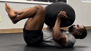 Build Serious Grappling Strength with This Sandbag Workout! 💪🏾