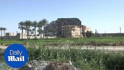 Suez Canal: Ever Given cargo ship remains stuck