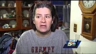 Family friend says mom shot to death in Dayton is 'smiling down on us'