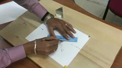 Path of refracted light through glass prism Prakash & Faisal