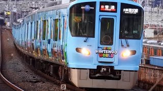 JR西日本323系LS15編成マリオラッピング車両18時26分発普通大阪·京橋方面行到着西九条駅他にて2024年1月14日