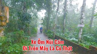 Experiencing a motorcycle taxi ride to the peak of Forbidden Mountain—the feeling of walking on c...