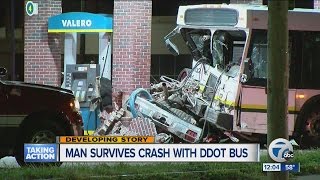 Man survives crash with DDOT bus