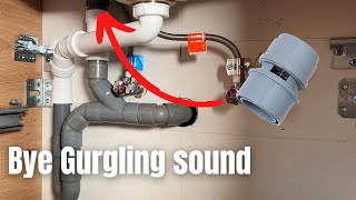 A plumber shows how to solve a gurgling noise from a sink drain screenshot 2