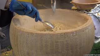 Italian Truffle Pasta In Real Parmigiano Cheese Wheel. London Street Food