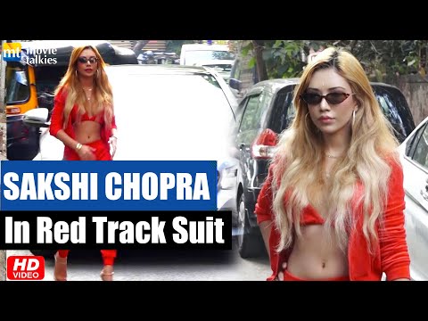 Sakshi Chopra wearing red track suit complains about HOT Mumbai Weather, talks about her music video