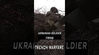 Ukrainian machine gunner firing Trench warfare army military