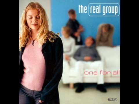 (+) The Real Group - Walking down the street