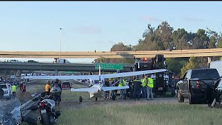 Small plane miraculously lands safely on I-15 freeway during rush hour | NBC 7 San Diego