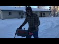 Snow blowing the driveway