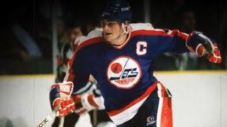 Dale Hawerchuk rings the Bell of Hope in Barrie after finishing