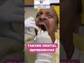 Taking dental impressions  happy smiles dental clinic  shorts