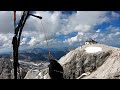 Flying just above hochknig in austrian alps on a paraglider